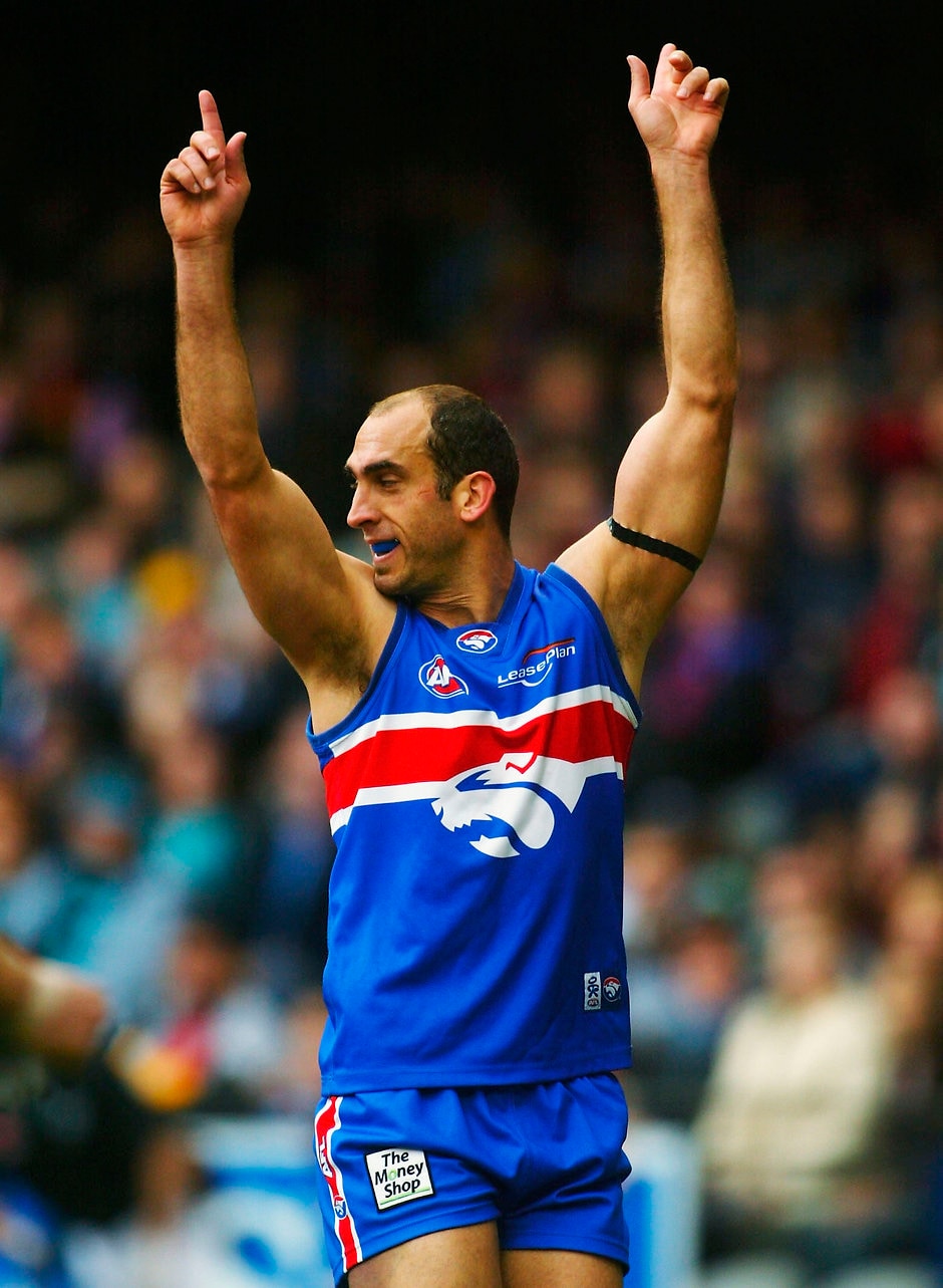 AFL 2003 Rd 15 - Western Bulldogs v Port Adelaide Matthew Croft for the Bulldogs celebrates a goal during the round 15 AFL match between the Western Bulldogs and the Port Adelaide Power at the Telstra Dome July 13, 2003 in Melbourne, Australia.